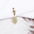 Detail shot of a golden spiral dreadlock hair clip with a vintage leaf pendant - Hollow Leaf Style (E7527-4#)