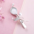 Detailed shot of silver flower hair clip with pear-shaped gem and sparkling rhinestones - Tulip Shape Silver Color (B3504)