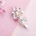 Detailed view of floral hair clip with pink crystals and rhinestone bow on silver base - Bow Shape Silver Color (B3504)