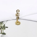 Detail of golden spiral dreadlock cuff with bohemian sun and eye charm on white fabric - Sun Eye Style (E7529-4#)