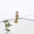 Detail view of retro bronze spiral hair ring with a delicate flower charm for dreadlocks - Small Flower Style (E7529-6#)