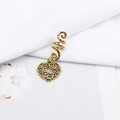 Detail of vintage gold spiral hair coil with intricate hollow heart pendant and floral carving - Hollow Petal Heart Style (E7525-11#)