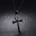 Detailed close-up of a polished black Ankh cross pendant with a metallic chain - Ankh Cross with Curb Chain / Black