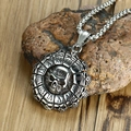 Nordic Viking skull pendant necklace with Roman numerals on a rugged rock surface - Roman Numeral Skull Pendant (With Steel Chain) / Silver