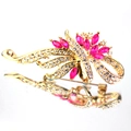 Elegante gouden bloembroche met fuchsia strass-steentjes en schitterende kristallen - Goud