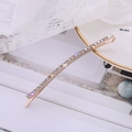Elegant rose gold hair clip with sparkling rhinestones in a minimalist barrette style - Rose Gold With White Rhinestones