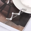 Elegante fermaglio per capelli ondulato argento con perle bianche e zirconi lucenti - Argento (C2416)