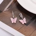Macro detail of butterfly earrings with pink resin charms and sparkling zircon studs - Dark Pink (B1221)