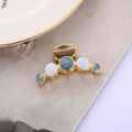 Detail of a mini gold metal hair claw with purple and blue oil painting enamel finish - Dark Green (C5505)