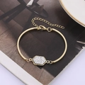 Vintage gold metal bracelet with a sparkling silver hexagonal center piece and adjustable clasp - Silver Gold Base