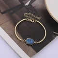 Detail of gold bracelet with hexagonal blue crystal and adjustable lobster clasp - Blue with Gold Base