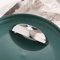 Sleek silver water drop metal hair clip with a mirror finish on a green matte tray - Silver C3303