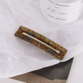 Eleganter rechteckiger Haarclip aus Acetat mit Schildpatt-Muster und geometrischem Ausschnitt - Bernstein Leopard