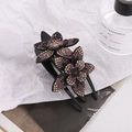 Detail von Vintage Blumen-Haarspange mit lila Strasssteinen auf Harzbasis - Lila + Champagner