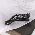 Elegant black duckbill hair clip with sparkling rhinestones and a secure inner comb design - Black