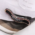 Close-up of curved banana hair clip with pink and champagne gradient rhinestones - Pink