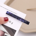 Detail of purple marble acetate hair clip with silver metal back on display card - Dark Blue Style (B7122)