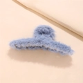 Detail shot showing the soft light blue faux fur texture of this elegant plush hair claw clip - Sky Blue