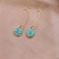 Detail of gold crystal drop earrings with light blue resin stones on silk background - Light Blue (B1310)