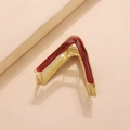 Detail view of V-shaped gold metal hair claw with marble textured dark red enamel finish - Wine Red (E5121)
