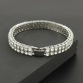 Macro detail of silver double-row tennis bracelet with sparkling zircon stones and fold-over clasp - 18cm / Silver