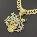 Close-up of gold plated tiger head pendant with green eyes and white rhinestones - Gold Pendant Only (Without Chain)