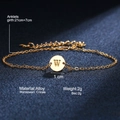 Golden alloy anklet featuring a 1cm round charm with engraved capital letter W - Letter W