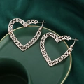 Close-up of rose gold hollow heart hoop earrings with retro floral carving detail - Heart Shape Rose Gold (A8536)