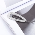 Detail of silver drop-shaped hair clip with unique sea salt texture and hollow design - Large Hollow Waterdrop Style (KC2237) / Silver
