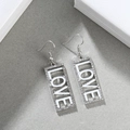 Silver rectangle drop earrings with rhinestones and LOVE lettering in hollow design - LOVE Silver + White
