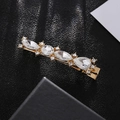 Elegant gold alloy hair clip with clear crystals in marquise and drop shapes - White (B7110)