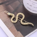 Fermaglio per capelli a serpente dorato con motivi a rombi e occhi di pietre blu su rivista - Oro con Strass (B9232)