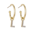 Detailed view of gold letter L pendant earrings with sparkling pavé crystal accents - Gold L
