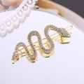 Fermaglio per capelli a serpente dorato con strass di cristallo su fondo riflettente - Oro B9333