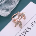 Elegant rose gold butterfly ring with sparkling diamonds and purple gemstones on lace - Rose Gold D8410