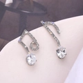 Elegant S925 silver music note earrings featuring white zircon pavé and asymmetrical design - Silver