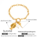 Golden stainless steel chain bracelet with fishbone, shell, and conch ocean charms - Fishbone Conch Clover Bracelet (SL41458)