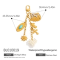 Gold stainless steel keychain featuring seashell, seahorse, and turquoise heart charms - Marine Elements Style (BL010019)