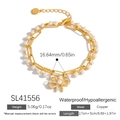 Zweilagiges goldenes Armband mit elegantem Schleifenanhänger und weißen Perlen - Schleifenanhänger-Stil (SL41556)