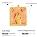 Macro detail of Hamsa Hand and Moon stainless steel charm with pink resin inlay - Stainless Steel Pink Astrology Charm (PJ92383)