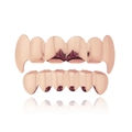 Front close-up of rose gold plated hip-hop dental grills with polished metal finish - Rose Gold Top Fangs and Bottom Flat Grillz