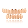 Detailed view of rose gold hip-hop grillz set with polished mirror finish and reflections - Rose Gold Set