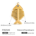 Golden fishbone pendant in stainless steel with a blue gemstone eye accent - Fishbone Shape (PJ92049)