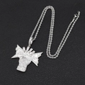 Dettaglio macro del ciondolo hip hop in argento con testo Really Rich e zirconi - Stile Argento / Catena da 60cm