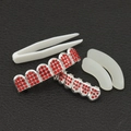 Hip hop grillz set met rode strassteentjes op zilveren basis inclusief siliconen strips - Zilver Rood Strass Boven En Onder