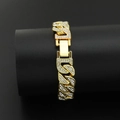 Macro shot of gold-tone Cuban chain bracelet with white rhinestones and a folding clasp - 20cm / Gold