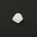 Macro shot of translucent white hip-hop grillz fixing wax on black reflective surface - Single Gum Bar