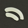 Close-up of off-white silicone mold for hip hop dental grillz on black leather - Top Eight Bottom Six Gum Set