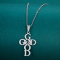 Close-up of stainless steel cross pendant featuring GOD and GOOD letter engraving - Full Cross Necklace