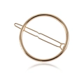 Detailed view of a minimalist golden circular metal hair clip with a polished finish - Golden Circle (B8306)
